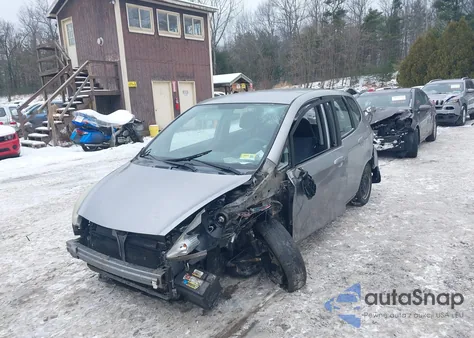 2007 Honda Fit из США, поврежденный, VIN JHMGD374X7S062354